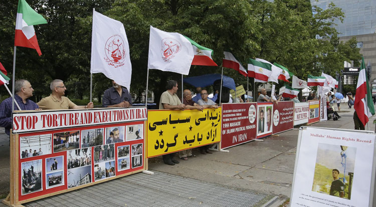 محکومیت موج اعدامها  نقض وحشتناک حقوق بشر در ایران - همبستگی با جنبش دادخواهی - تظاهرات در مونترال -کانادا